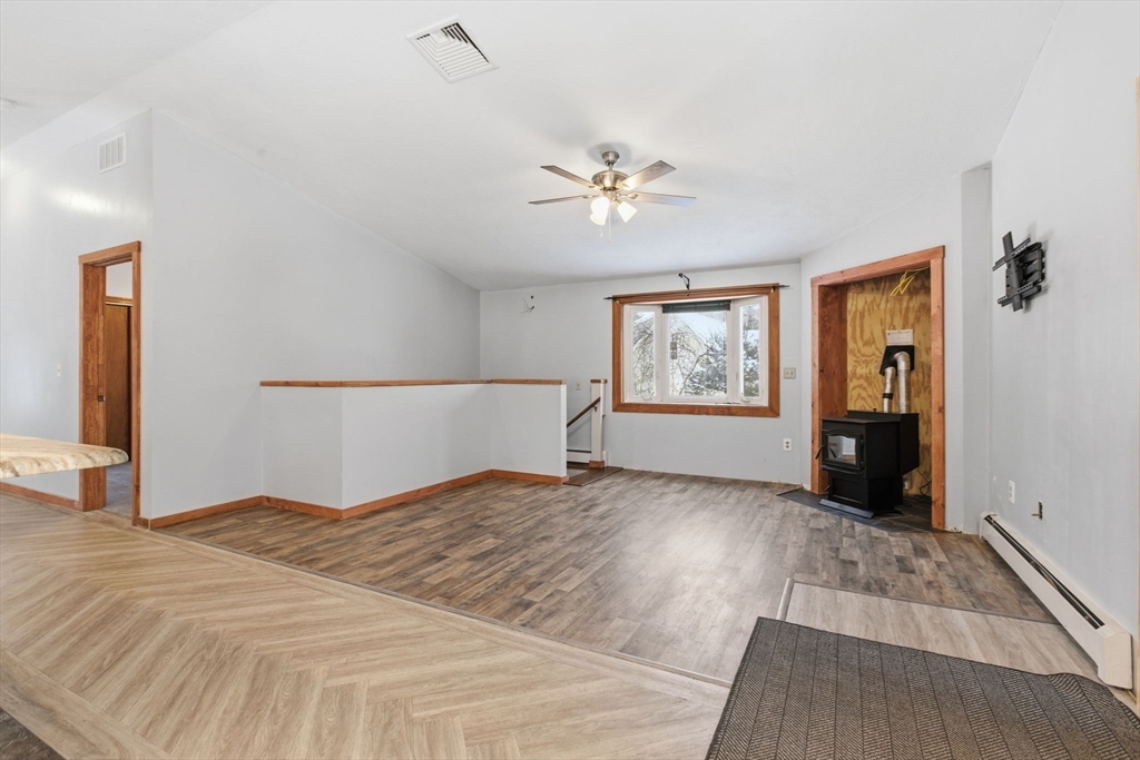 235 Crouch Road Warren, MA 01092 - Photo 16 of 42 a bedroom with a large bed and a window