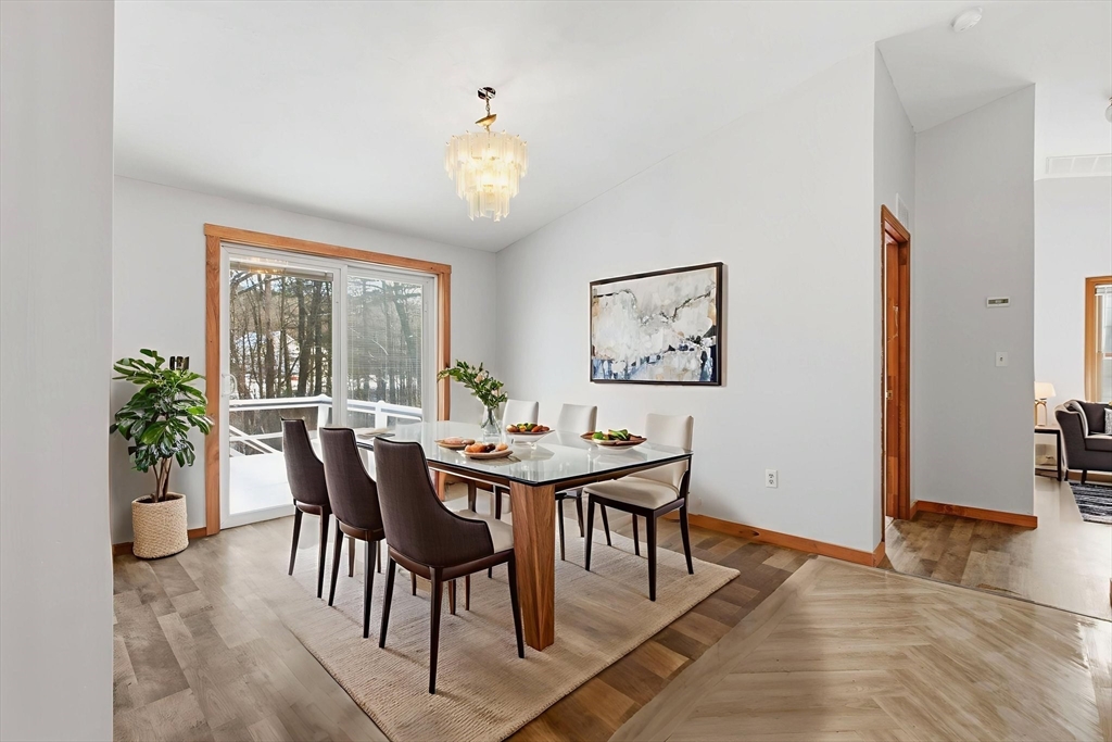 235 Crouch Road Warren, MA 01092 - Photo 19 of 42 a view of a dining room with furniture and window