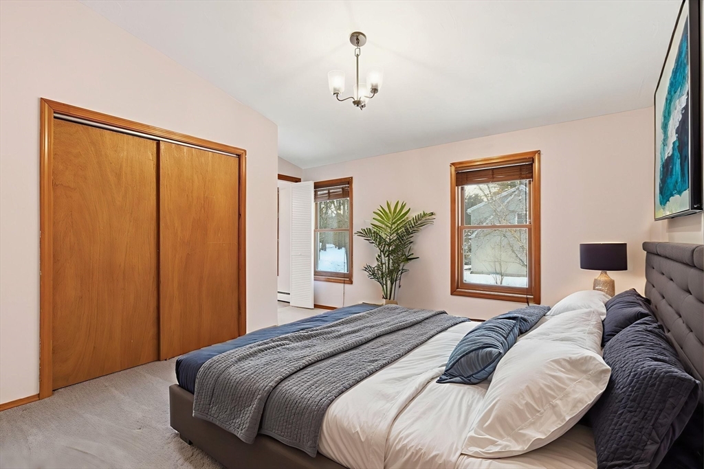235 Crouch Road Warren, MA 01092 - Photo 23 of 42 a bedroom with a bed and a window