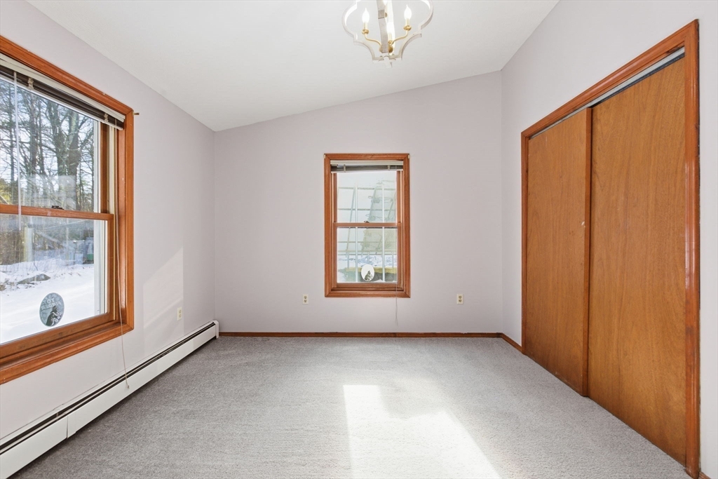 235 Crouch Road Warren, MA 01092 - Photo 27 of 42 a view of an empty room with a window