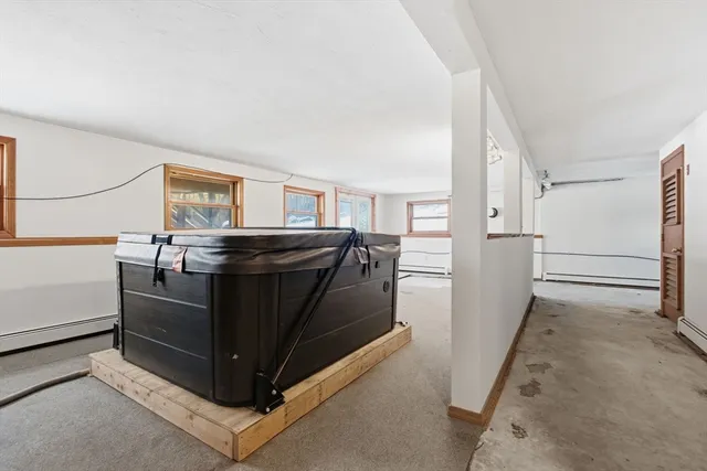 a kitchen with stainless steel appliances granite countertop a refrigerator and a stove