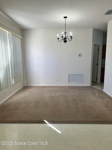 en empty room with windows