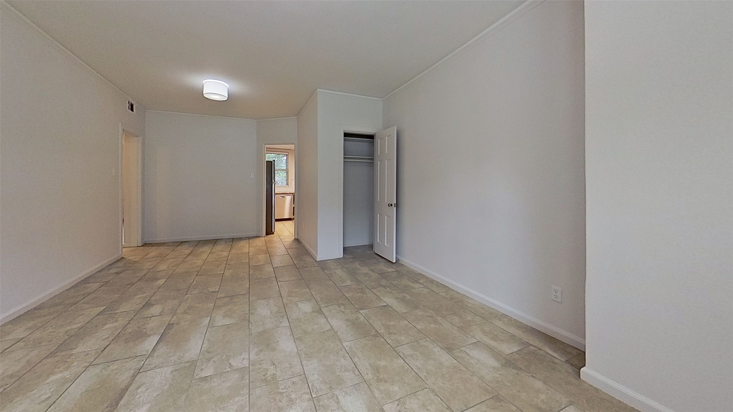 1703 Summit View Place, Unit A Austin, TX 78703 - Photo 8 of 13 A versatile living space with durable tiled flooring and easy access to the adjacent kitchen.