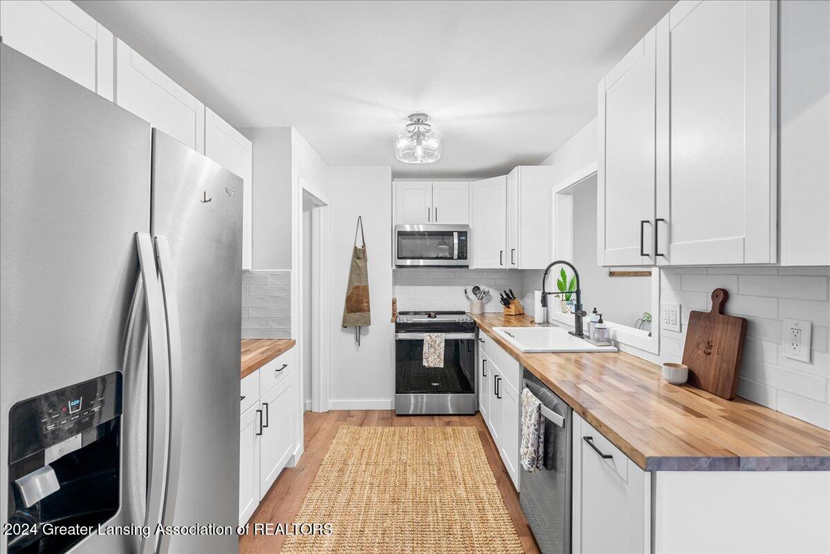 7402 Williamsburg Road Lansing, MI 48917 - Photo 8 of 29 17-Media Jett - 07