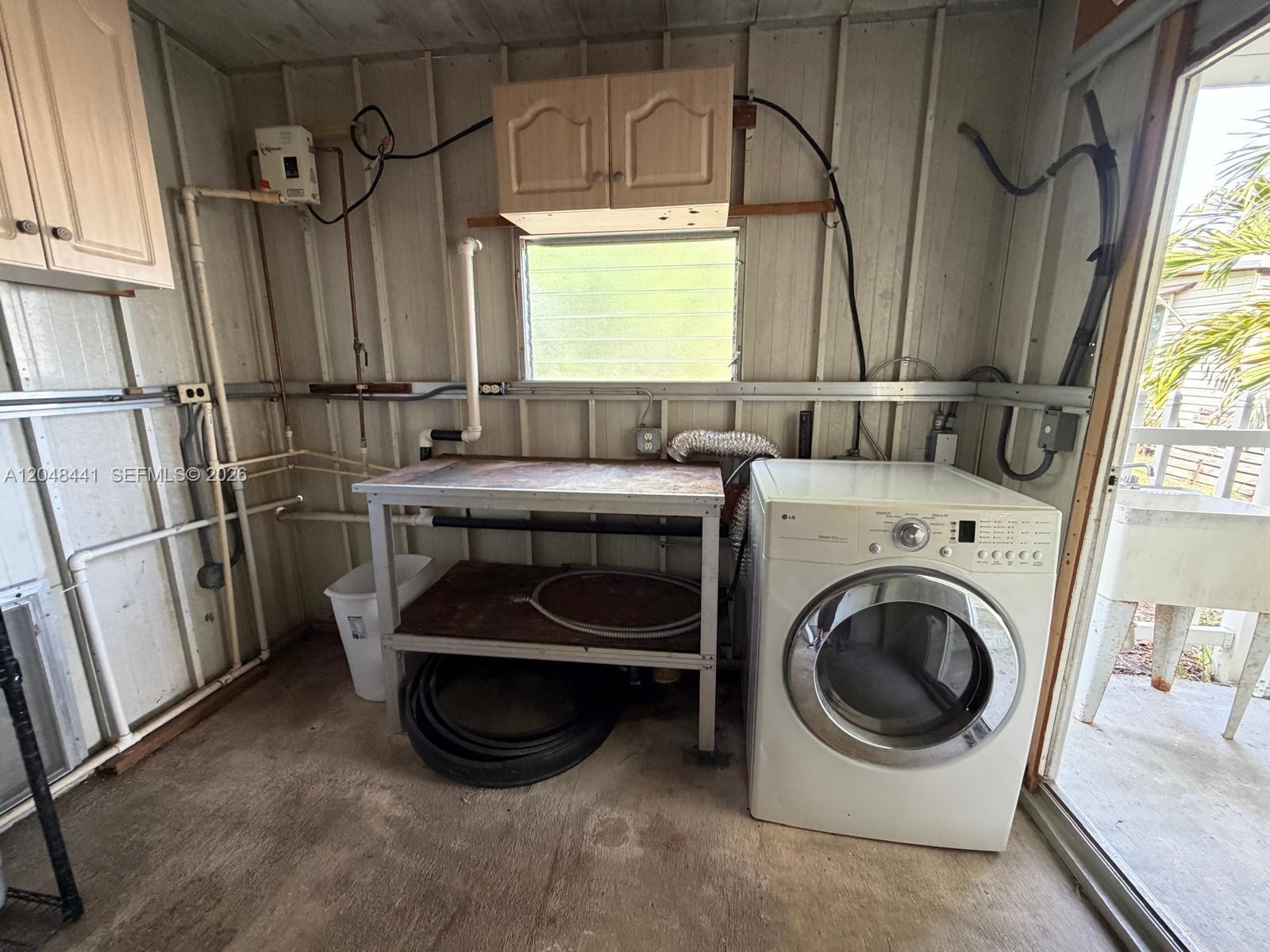 5331 Southwest 35th Street Davie, FL 33314 - Photo 26 of 31 a utility room with dryer and washer