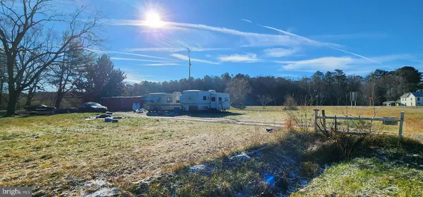 a view of a yard with an outdoor space