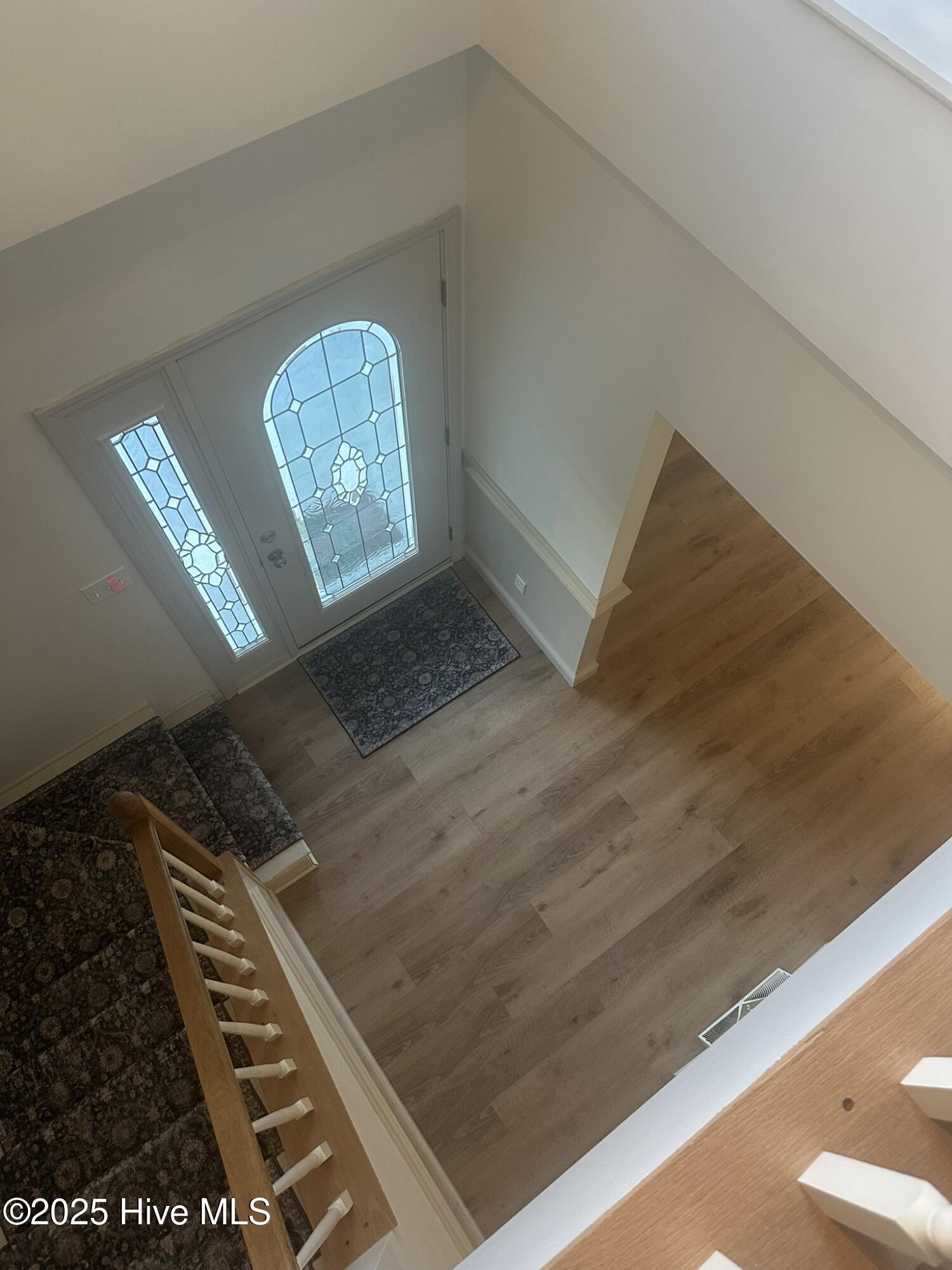 5735 Fire Dept Road Williamston, NC 27892 - Photo 40 of 69 View of Welcoming Foyer and Opening to Family Room from Large Upstairs Area
