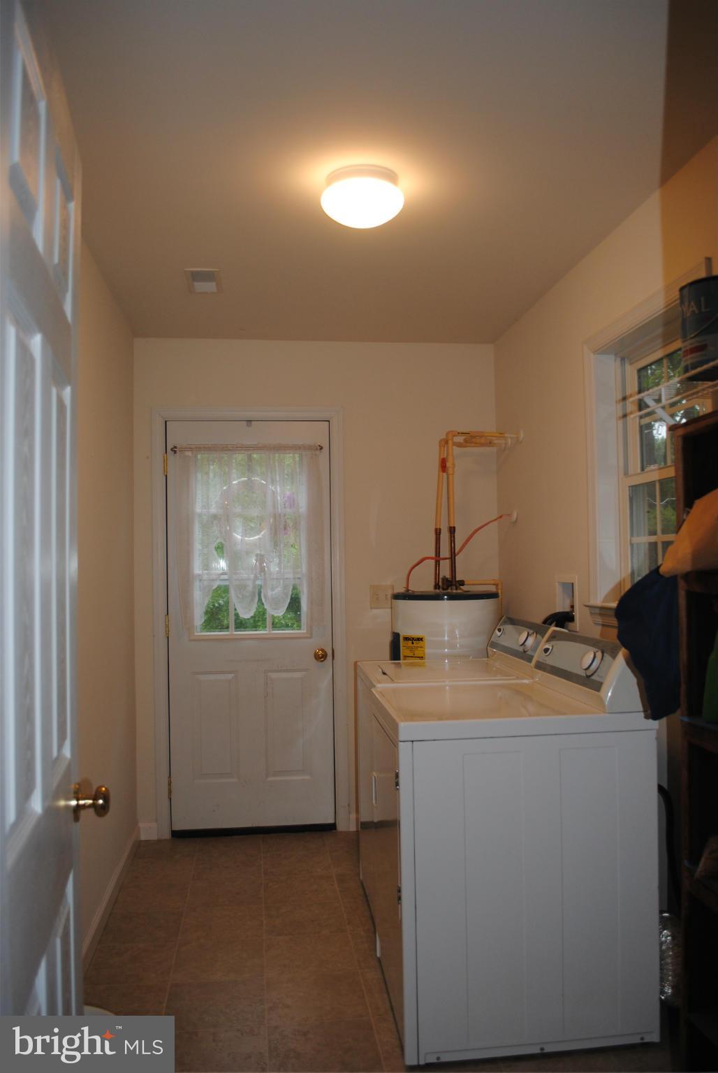 5767 Bay Road Rock Hall, MD 21661 - Photo 6 of 15 Laundry Room with outside entrance