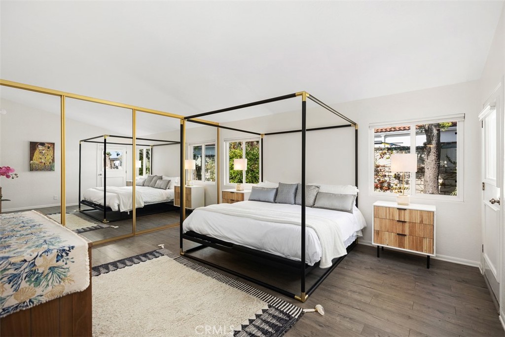 a bedroom with a bed and white walls