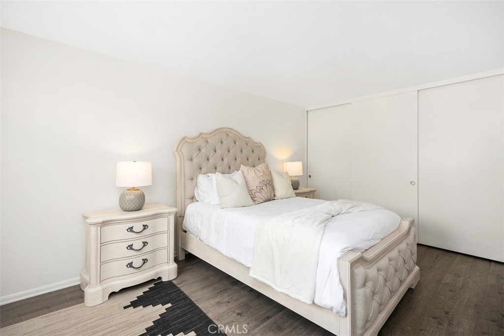 32321 Azores Road Dana Point, CA 92629 - Photo 16 of 30 a bedroom with a bed and a night stand