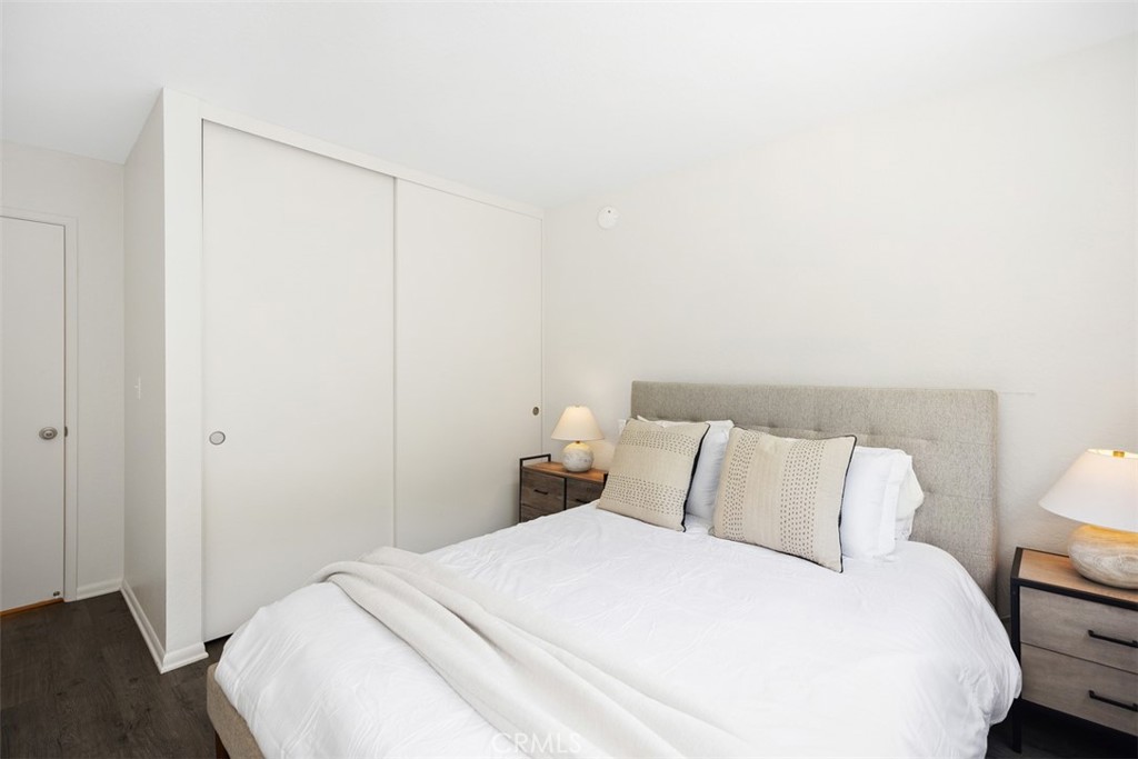 32321 Azores Road Dana Point, CA 92629 - Photo 19 of 30 a bedroom with a bed and a night stand