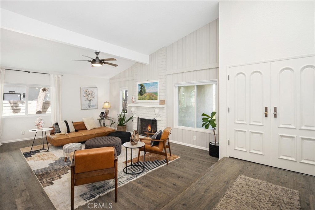 32321 Azores Road Dana Point, CA 92629 - Photo 2 of 30 a living room with furniture and a fireplace