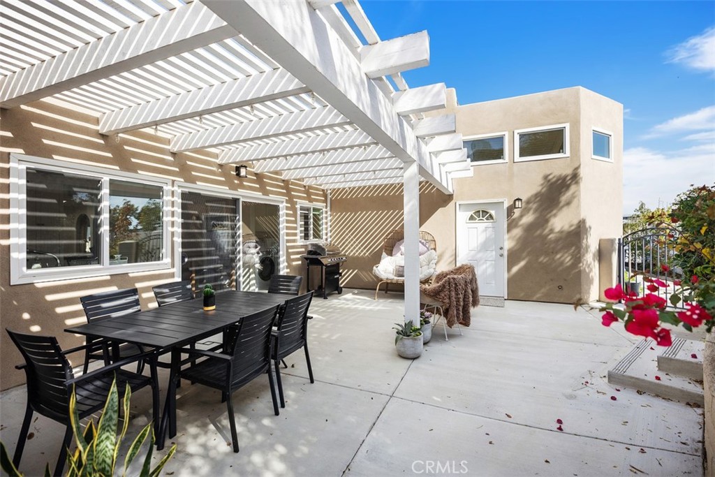 32321 Azores Road Dana Point, CA 92629 - Photo 26 of 30 a backyard of a house with table and chairs