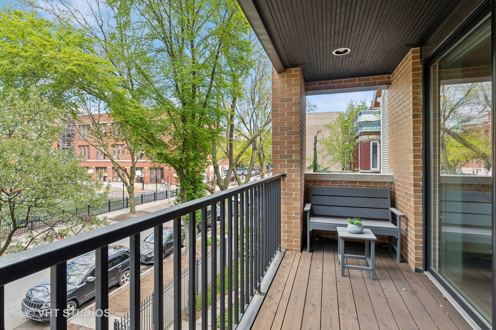 637 West Melrose Street, Unit 2 Chicago, IL 60657 - Photo 19 of 21 a view of balcony with wooden floor and outdoor seating