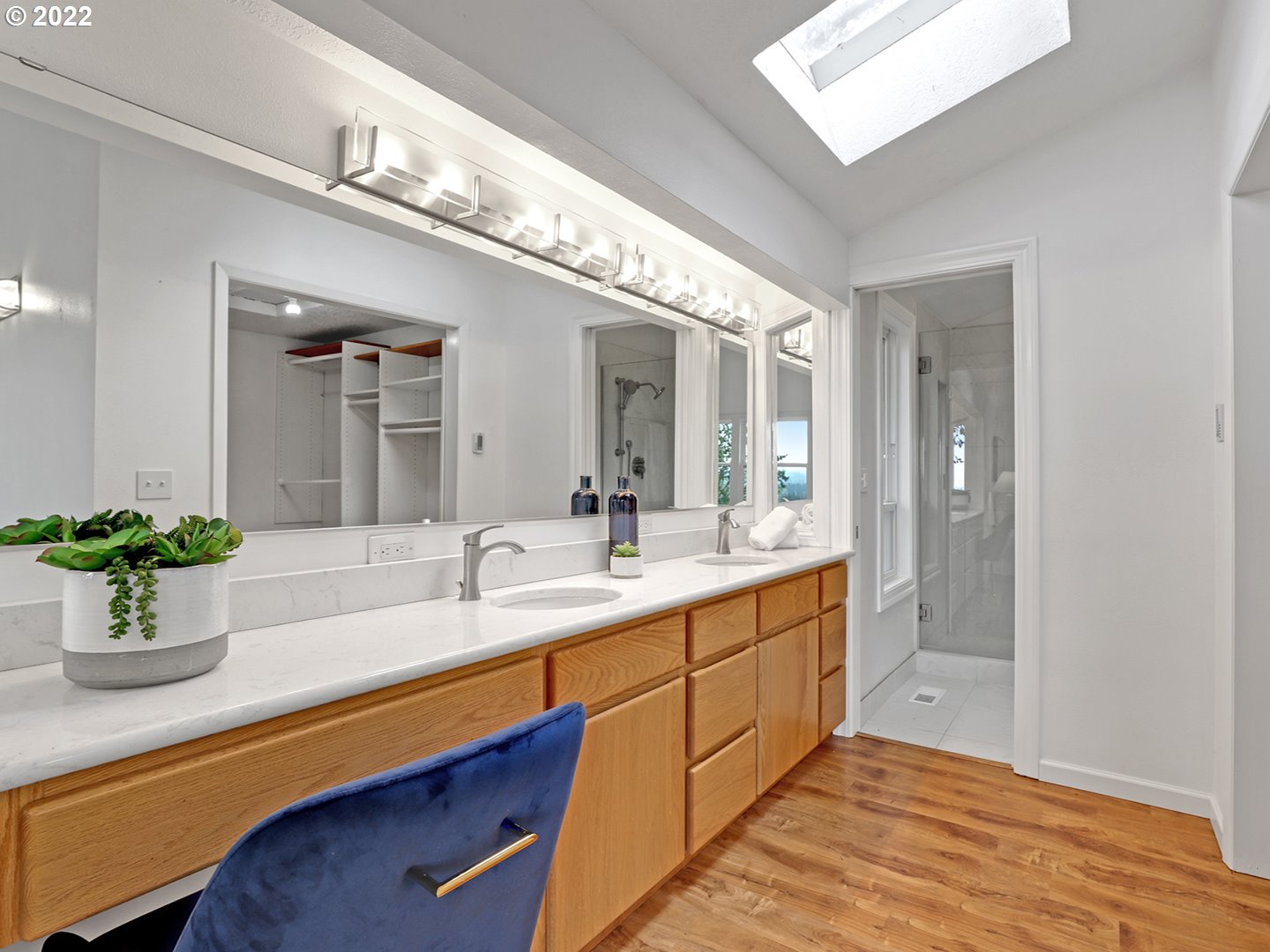 8500 Southwest Mapleridge Drive Portland, OR 97225 - Photo 14 of 30 a bathroom with a double vanity sink and a mirror