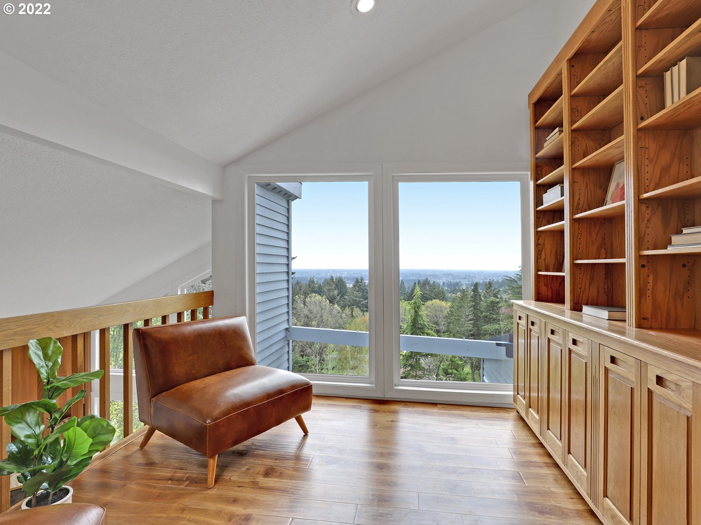 8500 Southwest Mapleridge Drive Portland, OR 97225 - Photo 15 of 30 a living room with furniture and a floor to ceiling window