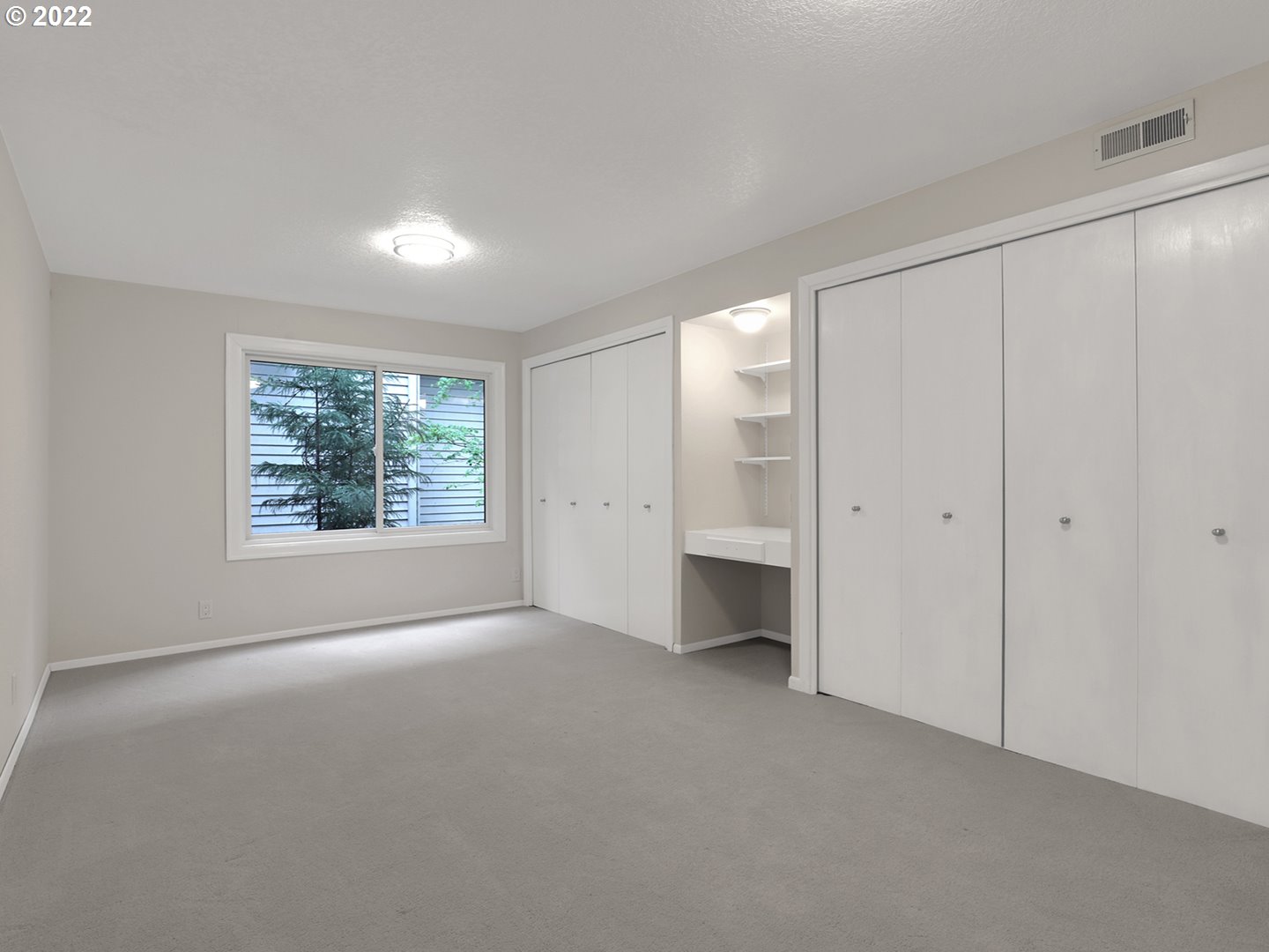 8500 Southwest Mapleridge Drive Portland, OR 97225 - Photo 20 of 30 a view of a livingroom with an empty space and window