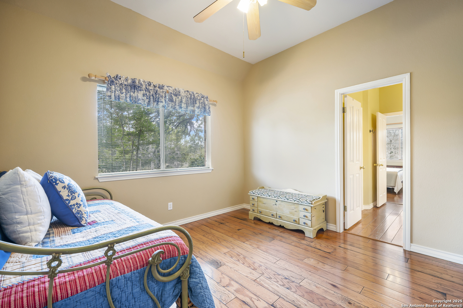 221 Park Ridge Boerne, TX 78006 - Photo 25 of 35 a bedroom with a bed and a window
