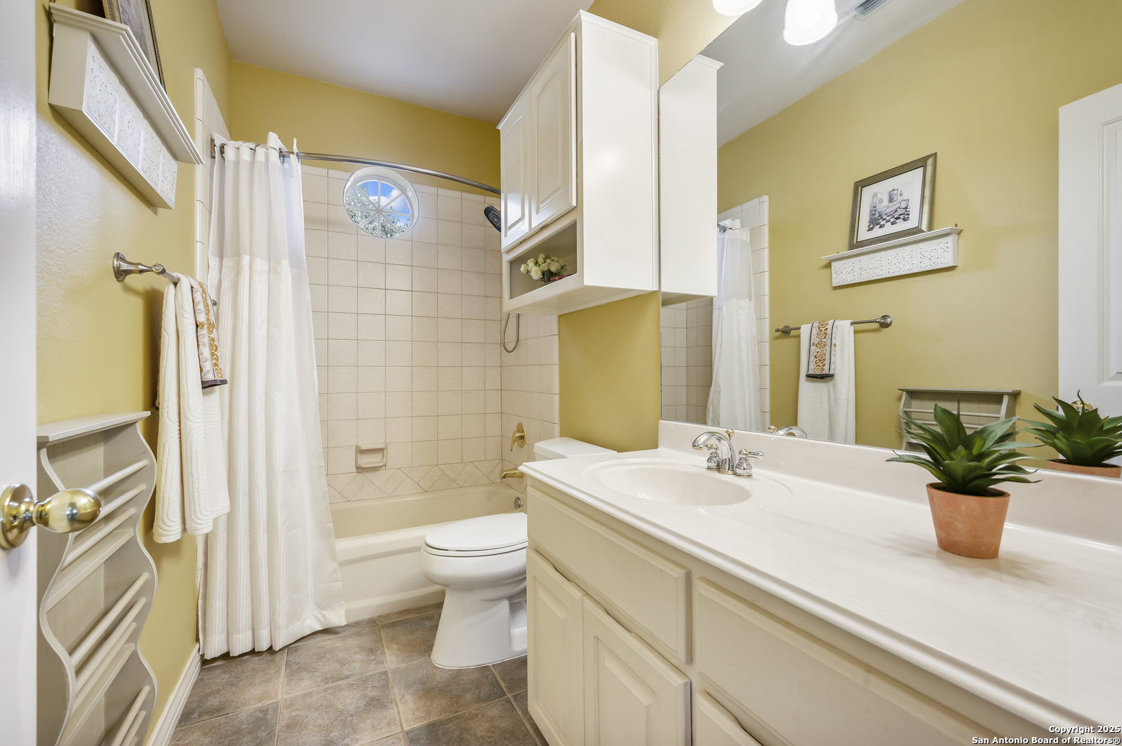 221 Park Ridge Boerne, TX 78006 - Photo 27 of 35 a bathroom with a granite countertop sink a toilet and shower
