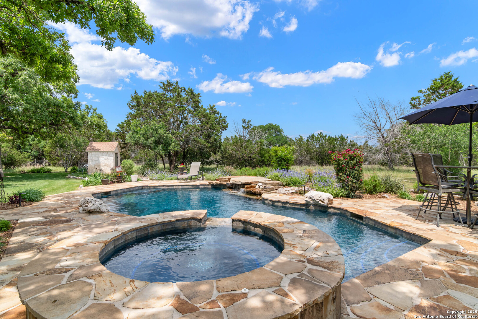 221 Park Ridge Boerne, TX 78006 - Photo 30 of 35 a view of a swimming pool with a patio