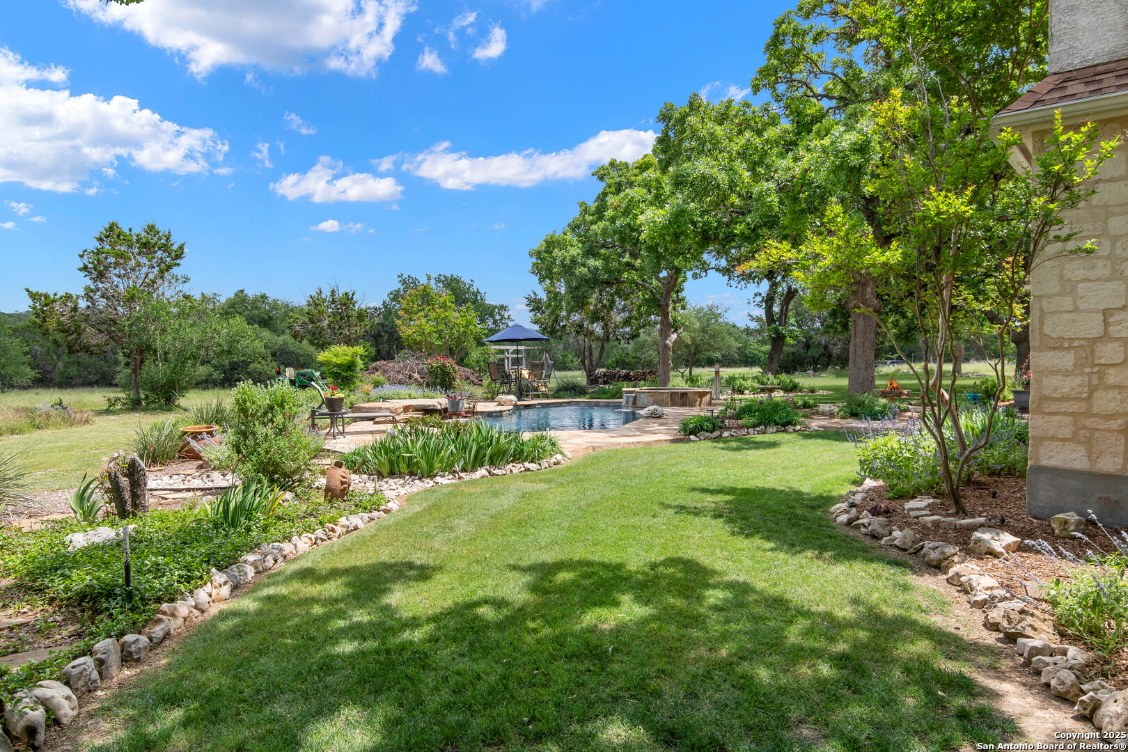 221 Park Ridge Boerne, TX 78006 - Photo 4 of 35 a view of a lake with houses