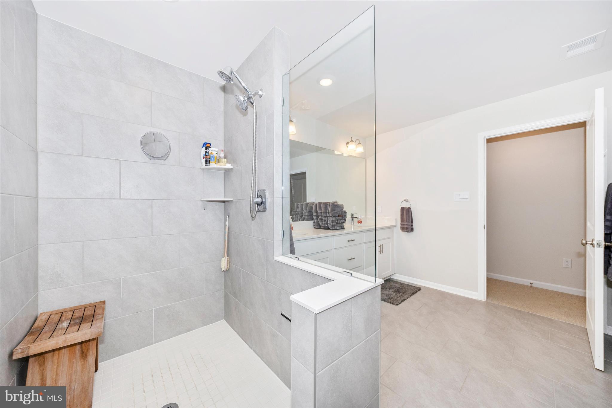 700 Bond Street Frederick, MD 21701 - Photo 21 of 49 a bathroom with a bathtub and a shower