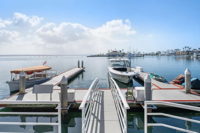 a aerial view of a house with a yard table and chairs