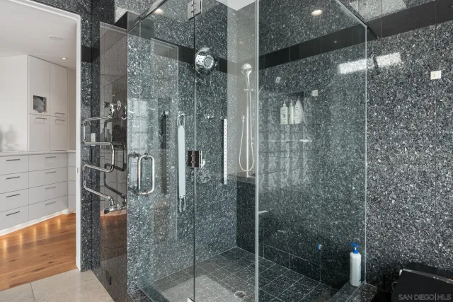 a kitchen with a stove and a refrigerator