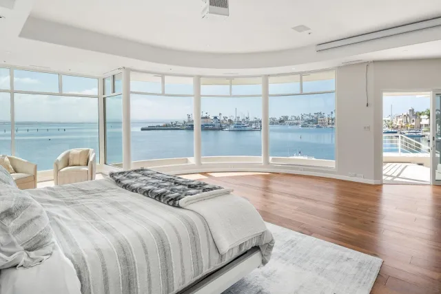 a kitchen with kitchen island granite countertop a stove and a sink