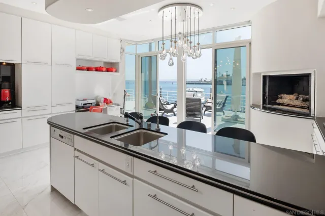 a kitchen with windows and sink