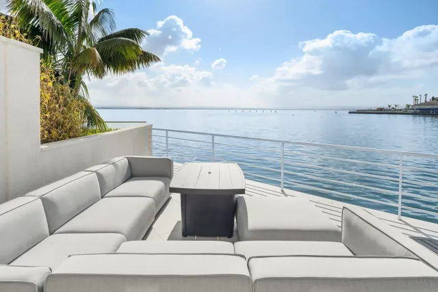 a view of a terrace with furniture