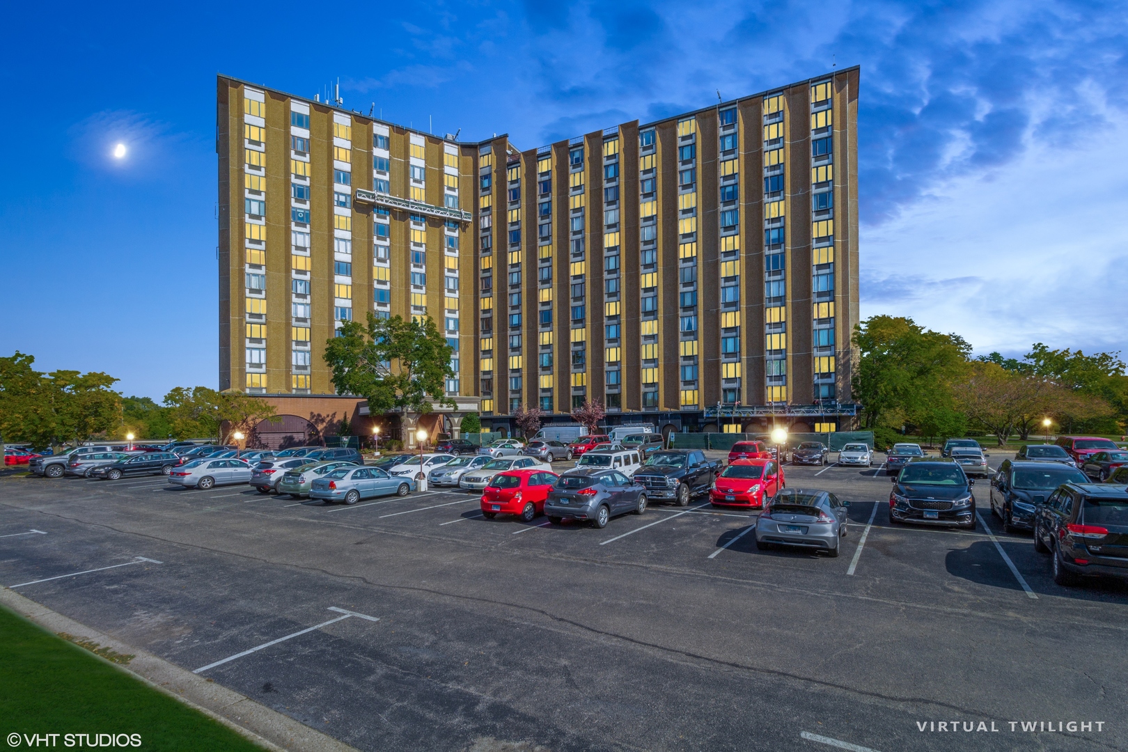 1 Renaissance Place, Unit 1117 Palatine, IL 60067 - Photo 1 of 20 a building with cars parked in front of it