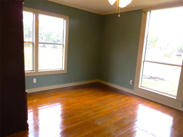 a view of an empty room and window