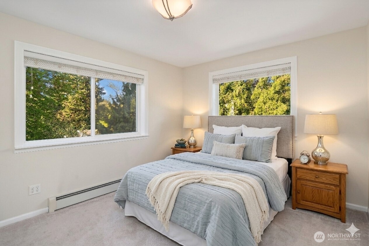 4014 Southwest 98th Street Seattle, WA 98136 - Photo 16 of 36 a bedroom with a bed and a window