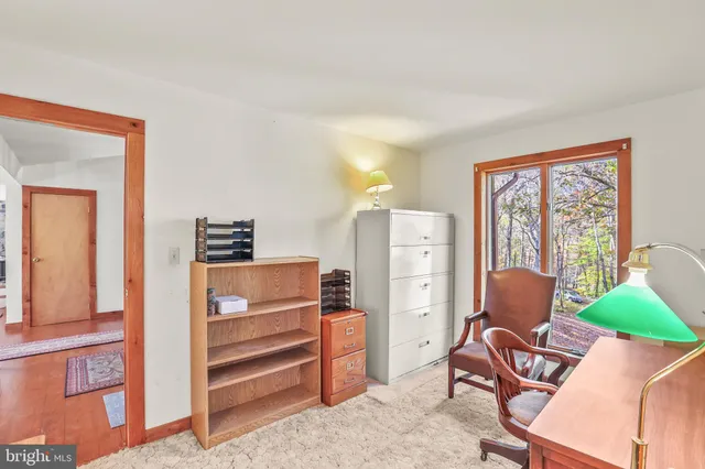 a room with furniture and a window