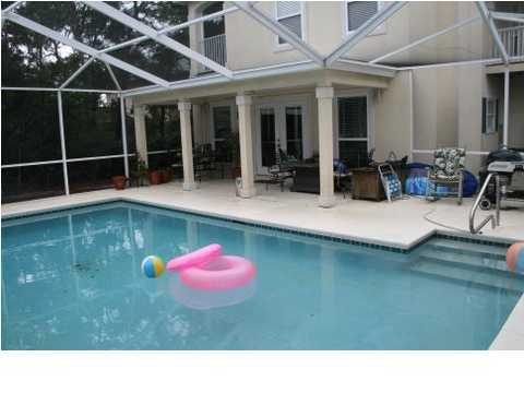 132 Emerald Ridge Santa Rosa Beach, FL 32459 - Photo 5 of 15 a swimming pool with outdoor seating