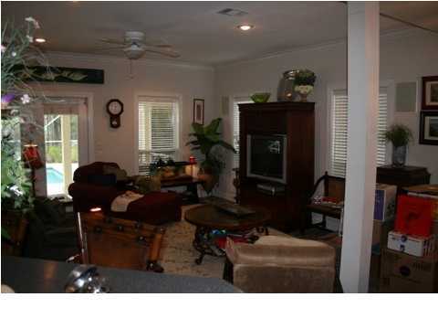 132 Emerald Ridge Santa Rosa Beach, FL 32459 - Photo 7 of 15 a living room with furniture and a fireplace