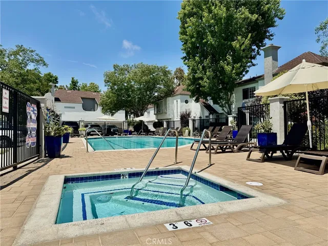 a view of a house with a swimming pool