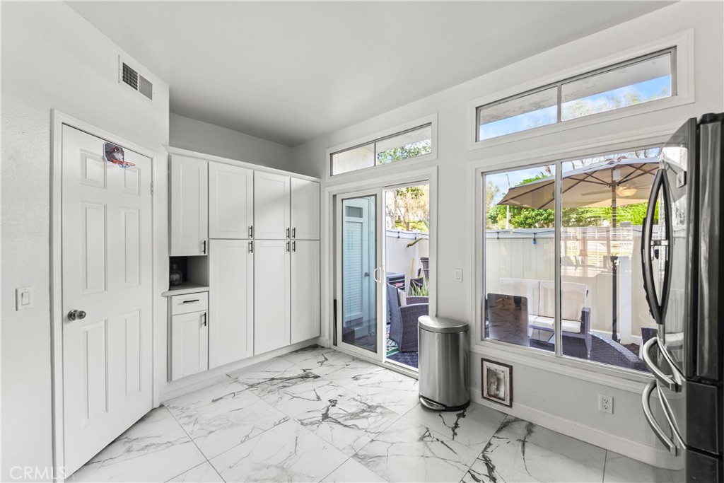 23653 Lexington Court, Unit 2 Laguna Niguel, CA 92677 - Photo 8 of 30 a view of a storage & utility room with windows