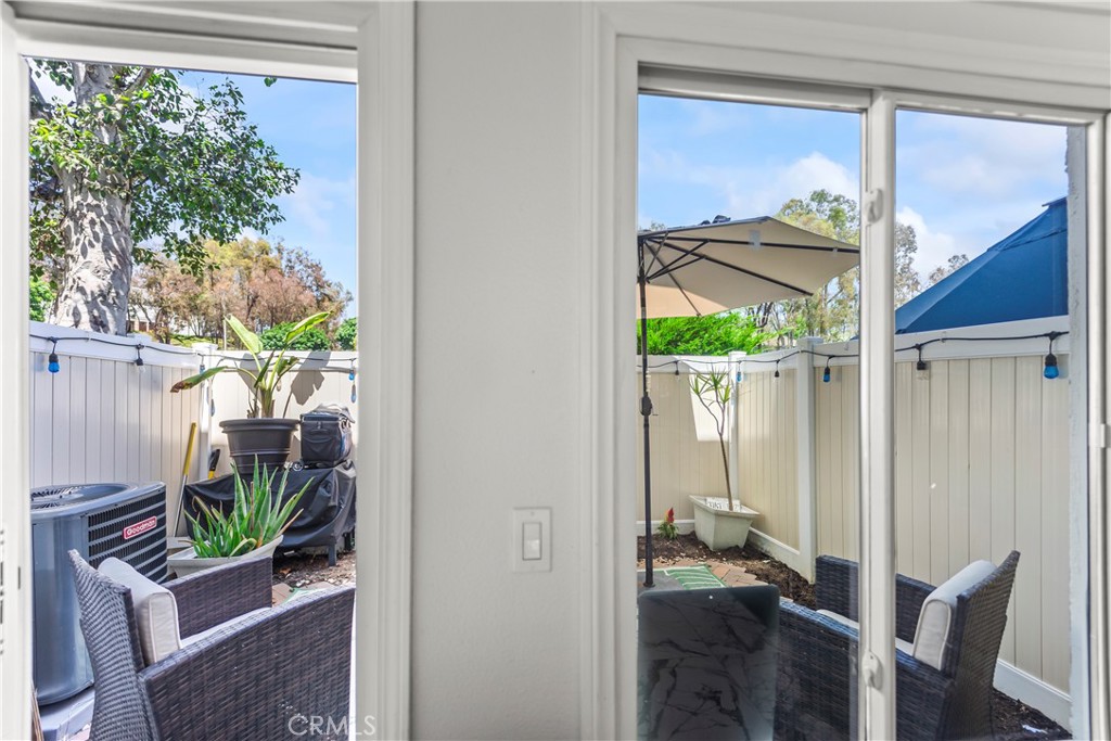 23653 Lexington Court, Unit 2 Laguna Niguel, CA 92677 - Photo 10 of 30 a view of entryway with wooden floor and a potted plant