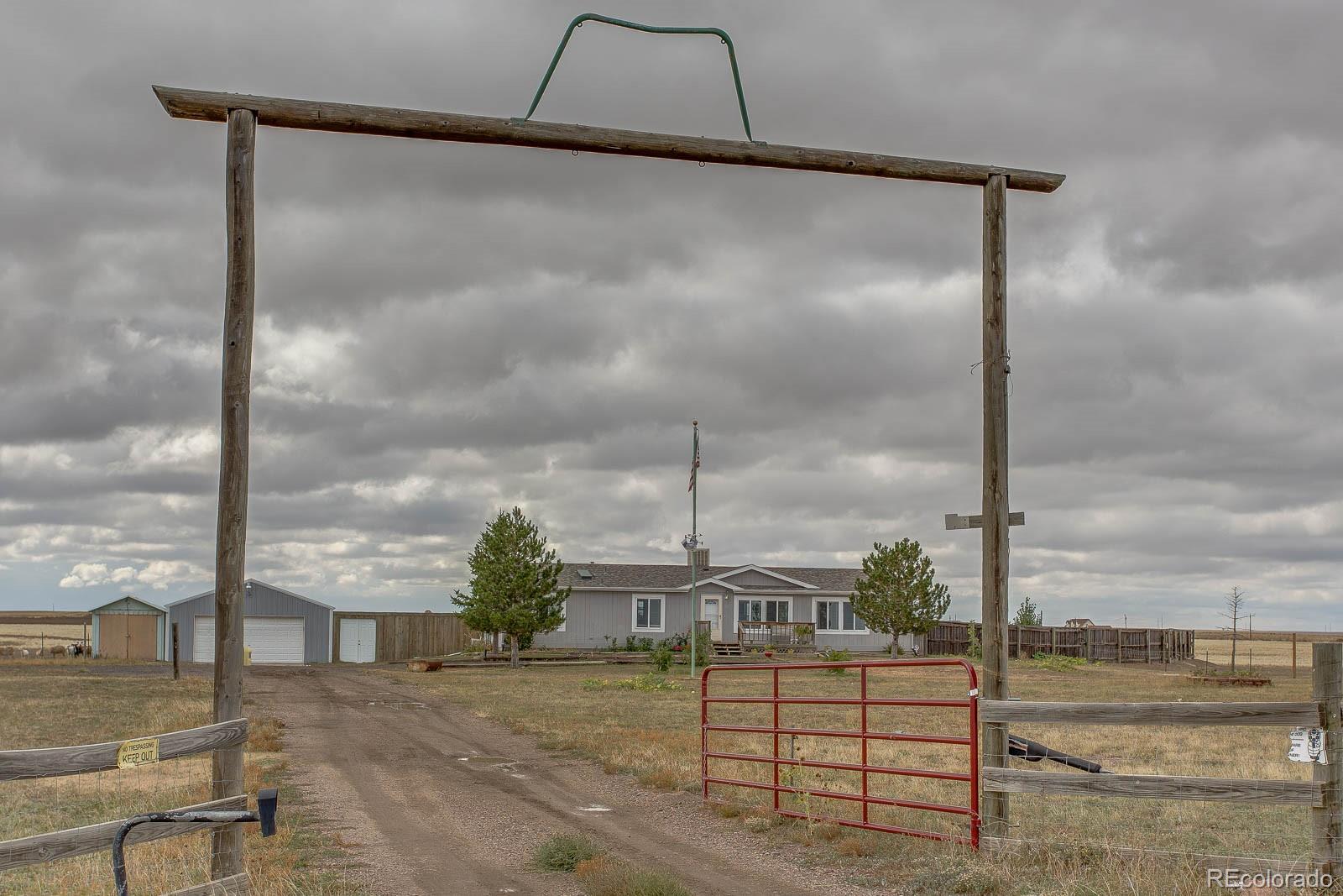 9651 Schumaker Road Bennett, CO 80102 - Photo 1 of 26 Gallery Image 1