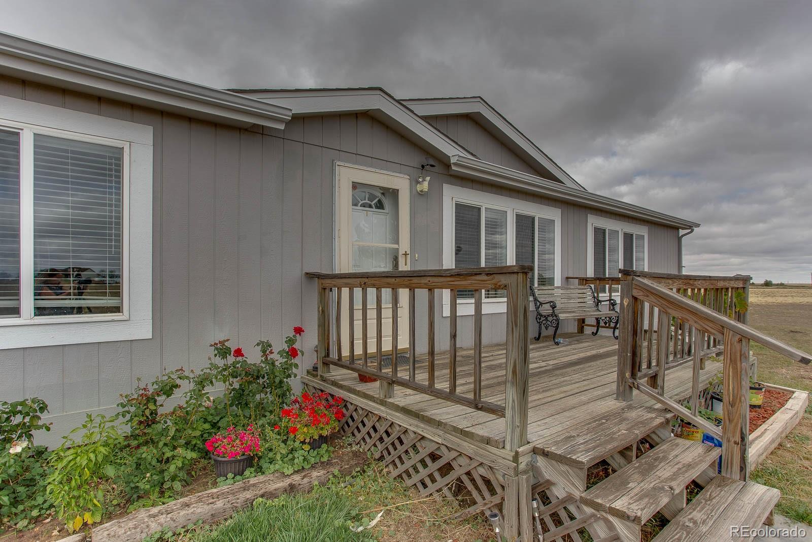 9651 Schumaker Road Bennett, CO 80102 - Photo 3 of 26 Gallery Image 3