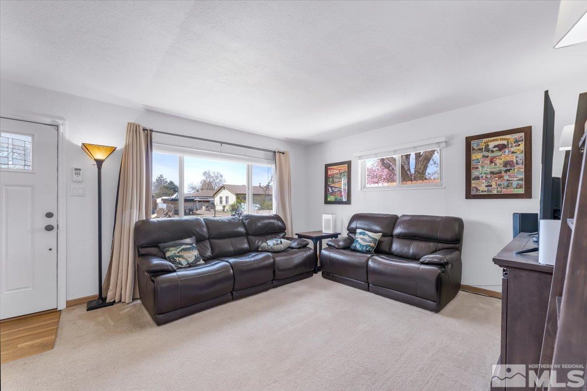 1640 Emerald Place Reno, NV 89502 - Photo 7 of 25 a living room with furniture and a couch