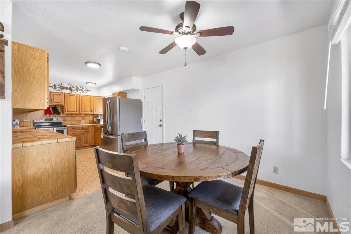 1640 Emerald Place Reno, NV 89502 - Photo 8 of 25 a view of a dining room with furniture