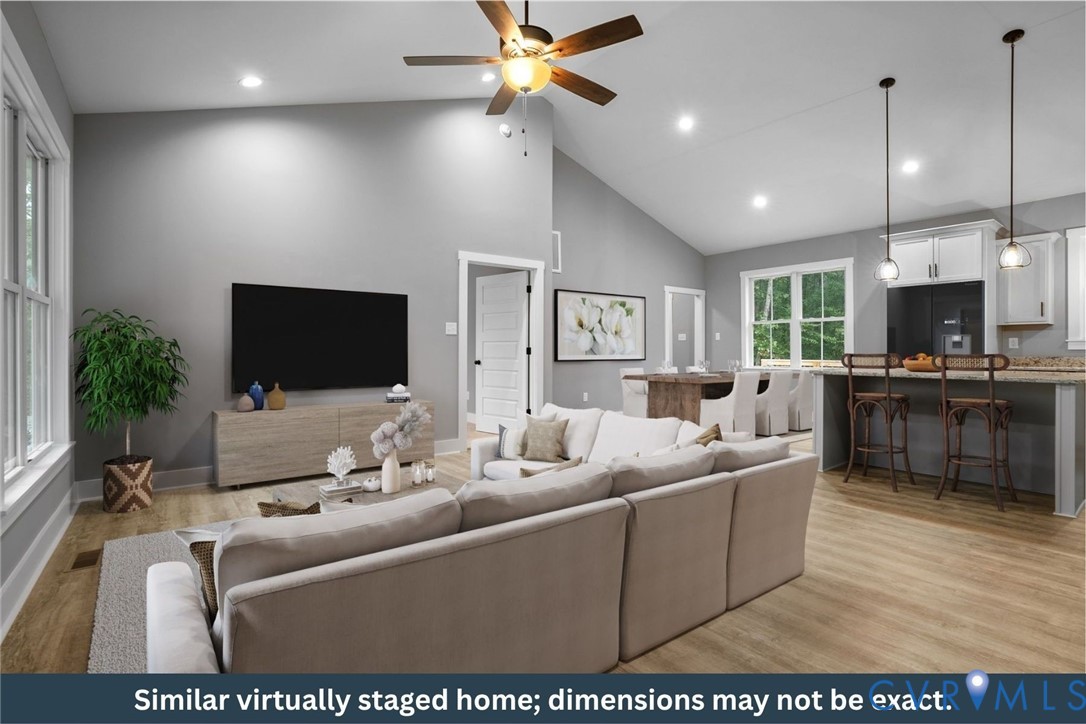 Tbd Lot K Briery Way Road Farmville, VA 23901 - Photo 3 of 18 a living room with furniture and a flat screen tv