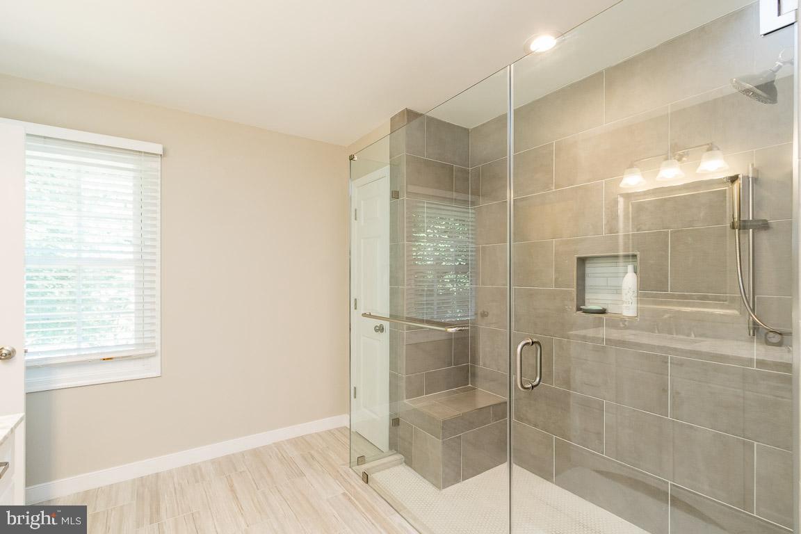 734 Ridge Drive McLean, VA 22101 - Photo 6 of 9 Master Bath has spacious glass shower.