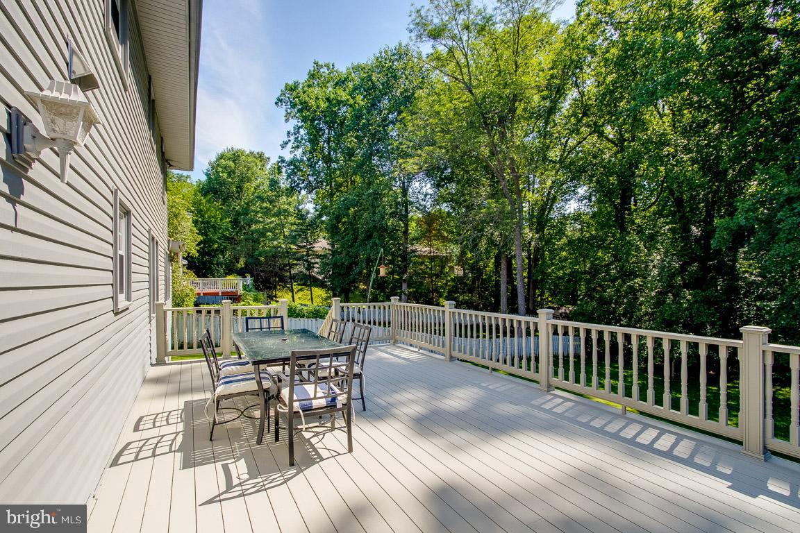 734 Ridge Drive McLean, VA 22101 - Photo 7 of 9 Huge deck overlooking awesome back yard.