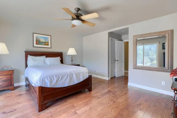 a bedroom with a bed and furniture
