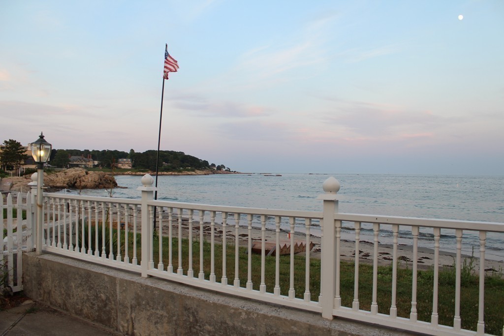 145 Puritan Road Swampscott, MA 01907 - Photo 11 of 19 a view of a balcony with wooden floor and fence