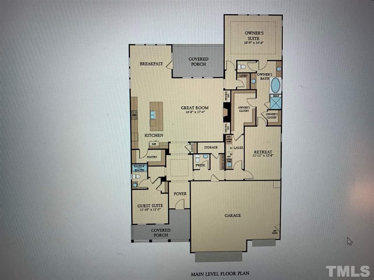 312 Rocking Ranch Court, Unit 15 Cary, NC 27519 - Photo 2 of 10 First floor luxury ranch plan features guest suite and Owner's suite + retreat room. 2509 SF on first floor.